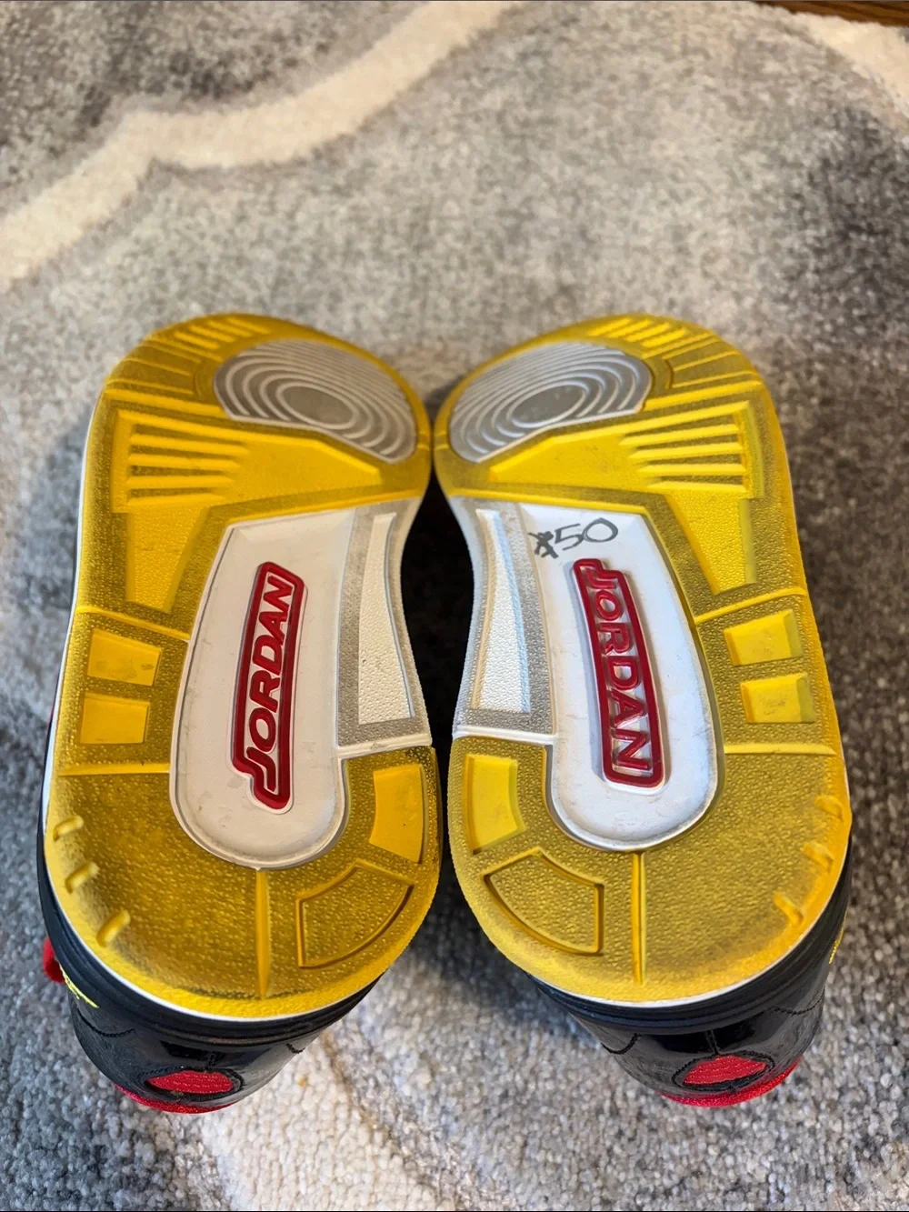Jordan’s black, red, and yellow